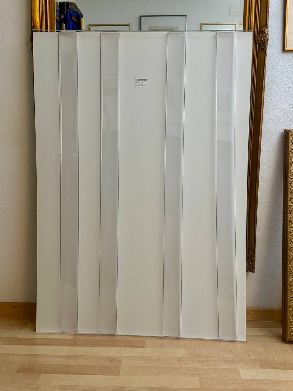 Ausstellungsplakat Ursula Bucher – Holzfiguren, Galerie Carla Renggli Zug 2010 — Rückseite